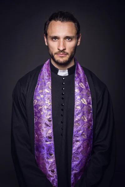 Portrait of young priest Royalty Free Stock Images