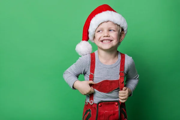 Beautiful little boy dressed like Christmas elf with big smile. Christmas concept Stock Image