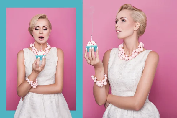 Beautiful young women holding small cake with colorful candle. Birthday, holiday — Stock Photo, Image