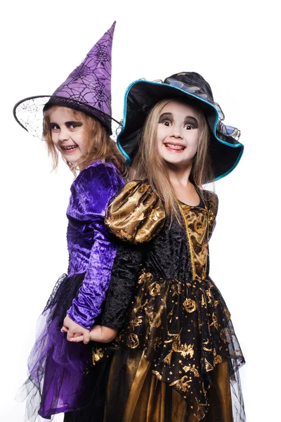 Witch kinderen met trick or treat. Halloween. Fee. Verhaal. Studio portret geïsoleerd op witte achtergrond — Stockfoto