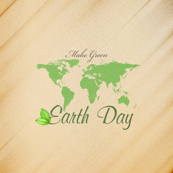 Dia da Terra fundo com as palavras, mapa do mundo e folhas verdes. Textura de madeira. Ilustração vetorial — Vetor de Stock