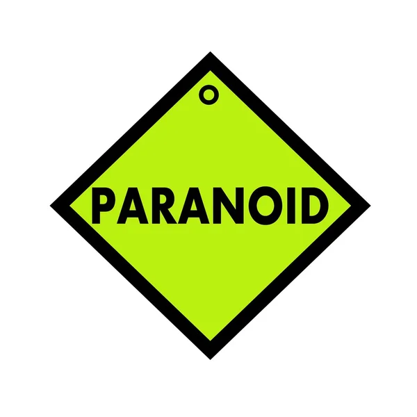 Чорне формулювання PARANOID на зеленому фоні — стокове фото
