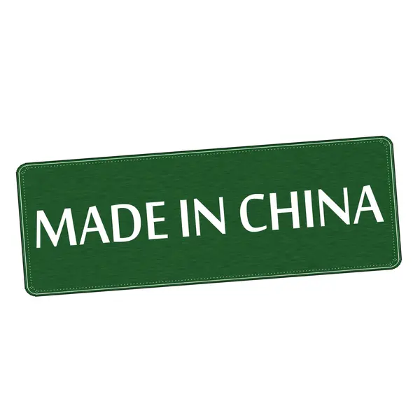 Made in china bianco formulazione su sfondo verde bordo di legno — Foto Stock