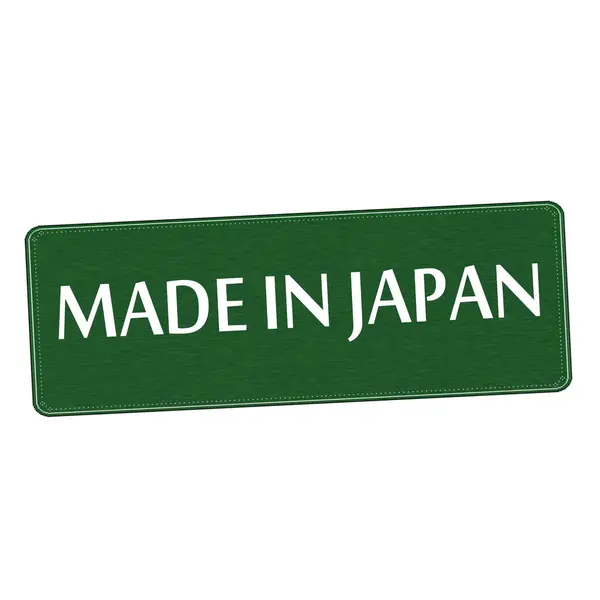 Made in japan bianco formulazione su sfondo verde bordo di legno — Foto Stock