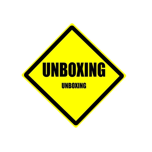 Unboxing texto carimbo preto no backgroud amarelo — Fotografia de Stock