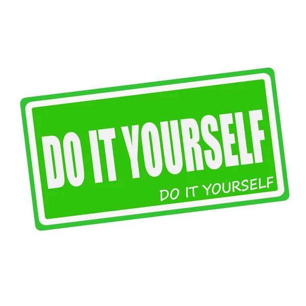 Do IT YOURSELF white stamp text on green — стоковое фото