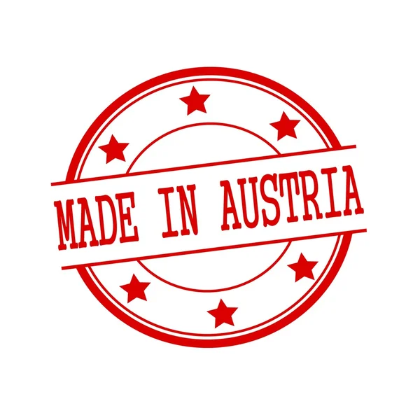 Сделано в Австрии текст красной марки на красном круге на белом фоне и звезде — стоковое фото