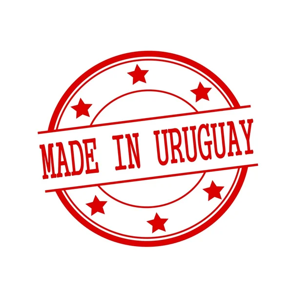 Made in Uruguay red stamp text on red circle on a white background and star — стокове фото
