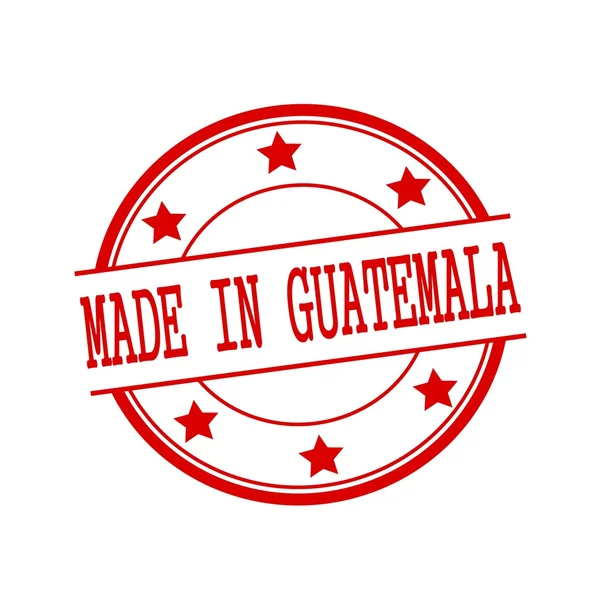 Сделано в Guatemala текст красной марки на красном круге на белом фоне и звезде — стоковое фото