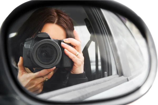 Onun profesyonel kamera kullanarak fotoğrafçı.