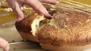 Breakfast of fresh baked homemade hot bread. Rural tradition of baking food from dough.  