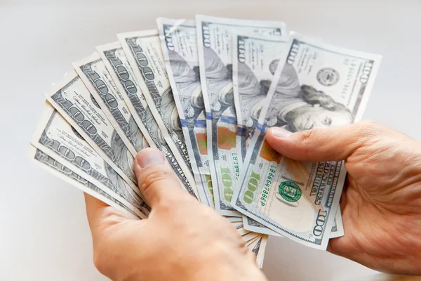 Hand met geld - Amerikaanse dollar — Stockfoto
