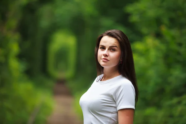 Beautiful girl in tunnel of love — Stock Photo, Image