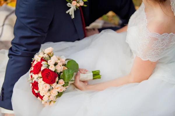 Autumn wedding bouquet in hands — Stock Photo, Image