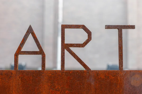 Roestige metalen teken. brieven Art — Stockfoto