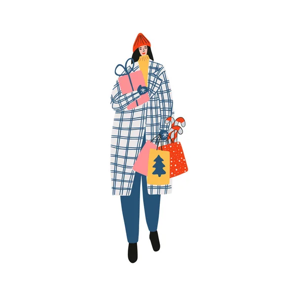 一个穿着时髦冬衣的年轻姑娘，手里拿着包裹和盒子，手里拿着圣诞礼物 — 图库矢量图片