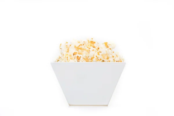 Popcorn in einer quadratischen Schüssel — Stockfoto