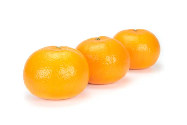 Oranges arranged to symbolize teamwork or unity — Stock Photo, Image