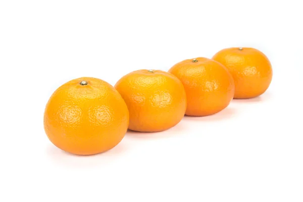 Oranges disposées pour symboliser le travail d'équipe ou l'unité — Photo