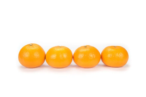 Oranges arranged to symbolize teamwork or unity — Stock Photo, Image