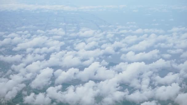 View from the top, above the clouds, rural scene below — Stock Video