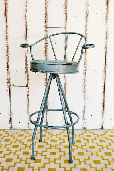 Vintage stool with white wooden background. — Stock Photo, Image