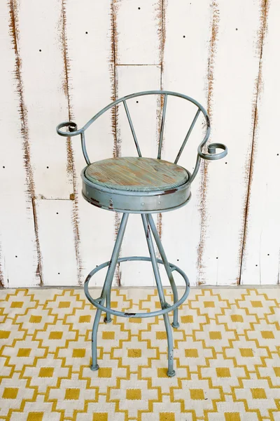 Vintage stool with white wooden background. — Stock Photo, Image