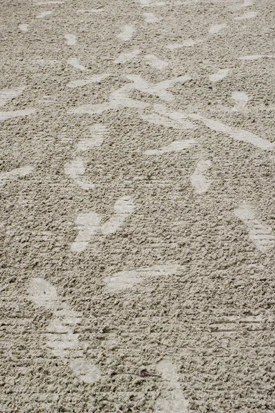 混乱して砂の上の足跡 — ストック写真