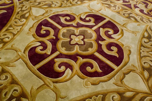 红色和金色东方波斯地毯背景纹理 — 图库照片