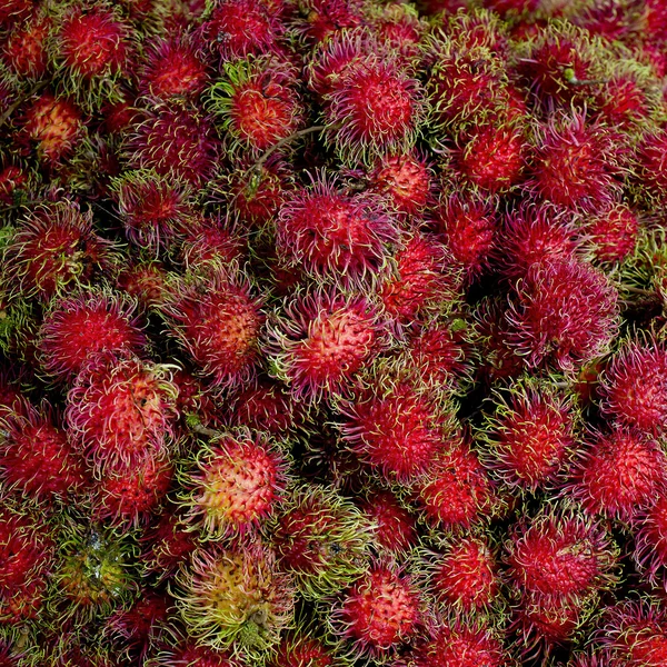 Közelről rambutan édes finom gyümölcs háttér — Stock Fotó