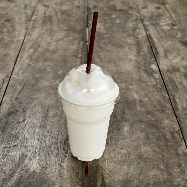 Fresh milk shake drink on wooden table. — Stock Photo, Image