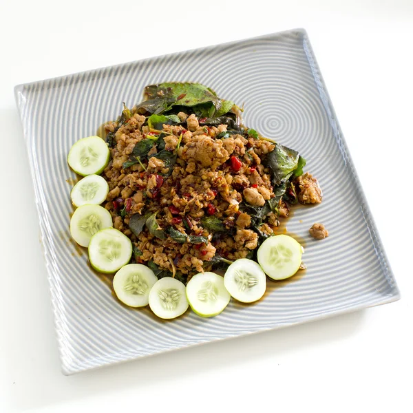 Thai spicy food basil meat fried recipe (Krapao Mooi) on square — Stock Photo, Image