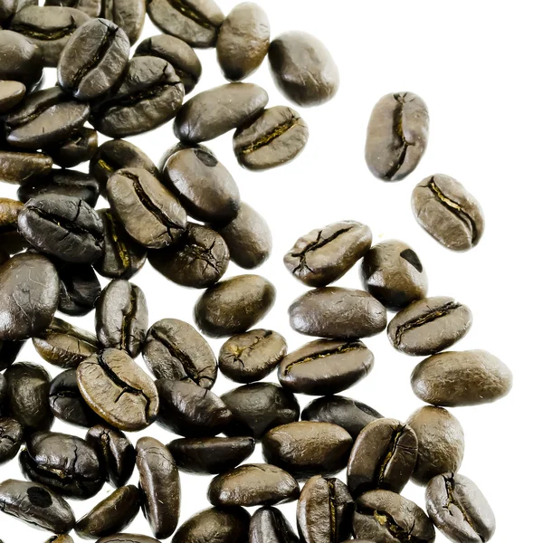 Coffee beans spilling around isolated on — Stock Photo, Image