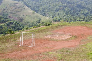Football playground on the hill in North of Thailand clipart