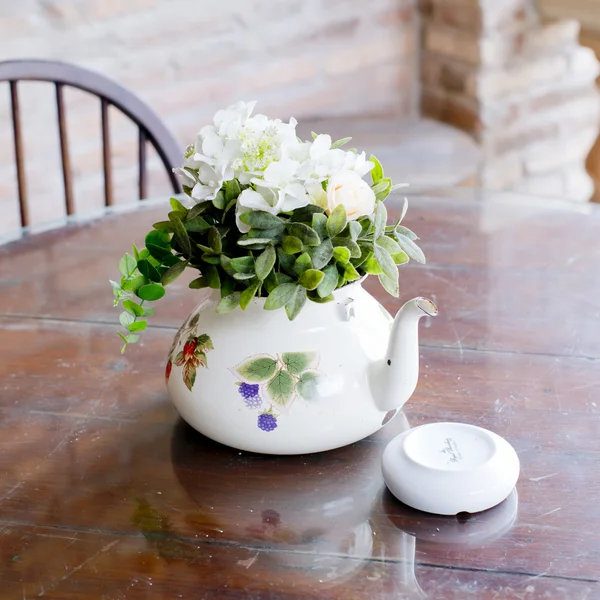 Vase of beautiful flowers on coffee table - home decor — Stock Photo, Image