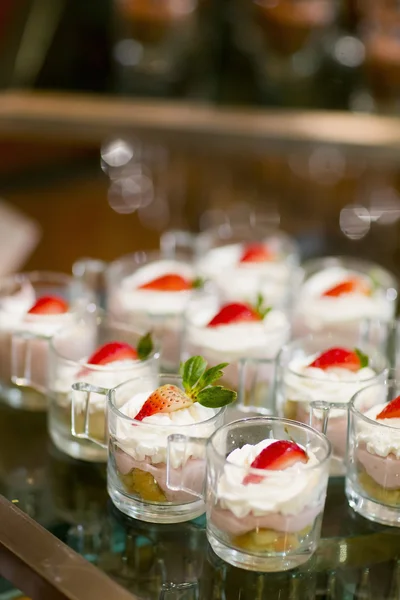 Many servings of sweet tasty dessert on buffet — Stock Photo, Image