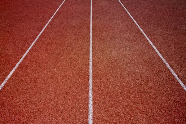 Pista de corrida para o fundo atletas — Fotografia de Stock