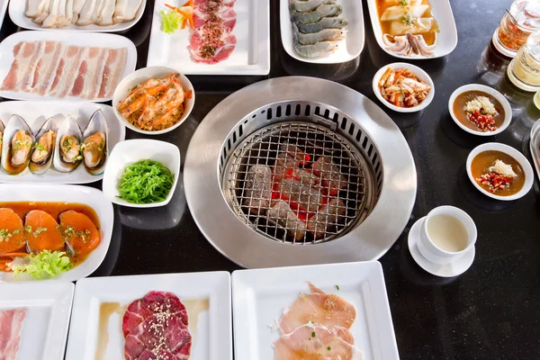 Assorted meat and seafood uncooked and roaster ready to be grill — Stock Photo, Image