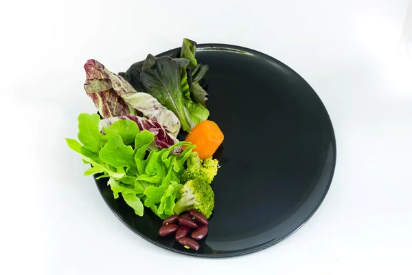 Vegetable salad on plate with blank spcae for wording — Stock Photo, Image