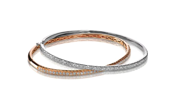 White and rose gold bangle bracelets — Stock Photo, Image