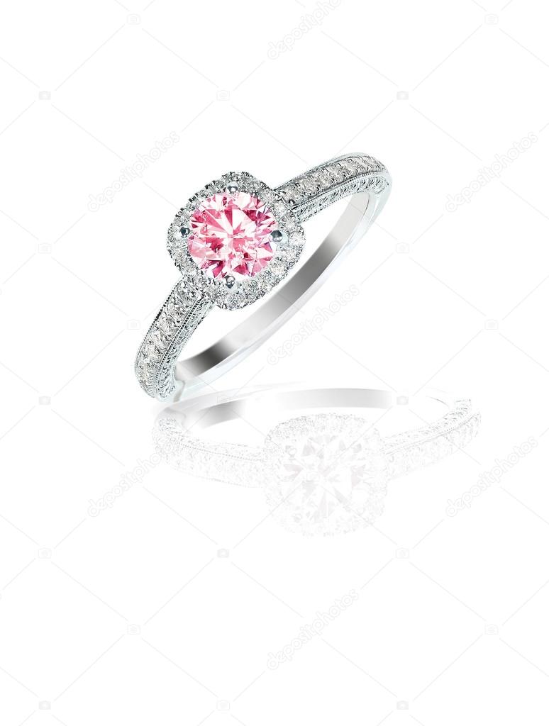 Pink diamond halo engagement wedding ring isolated on white