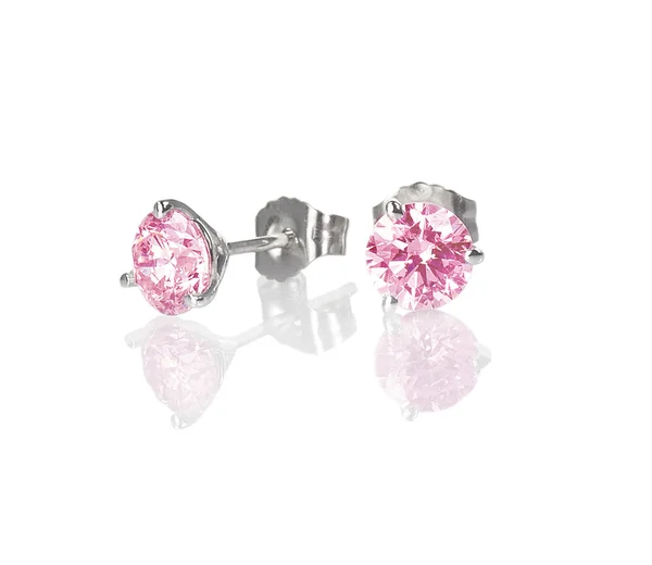 Pink diamond gemstone stud earrings isolated on white with a reflection