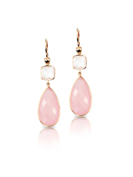 Pink rose quartz and crystal pear shaped drop earrings isolated on white with a reflection — Stock Photo, Image