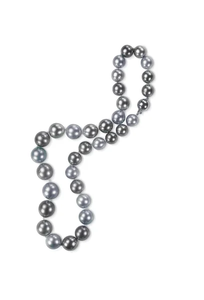 Hermoso collar de perlas aislado sobre un fondo — Foto de Stock