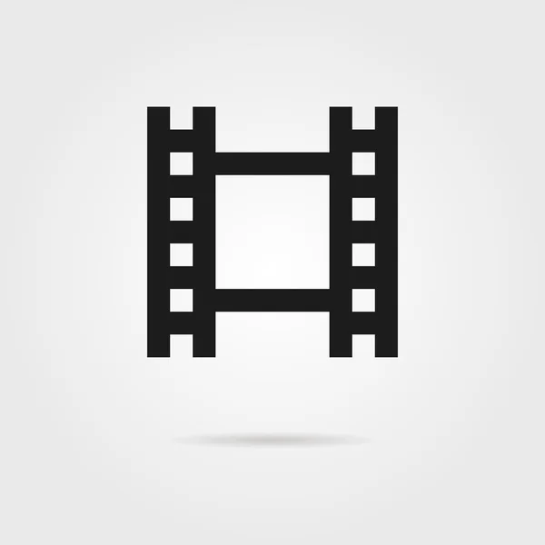 Película celuloide simple icono negro — Vector de stock