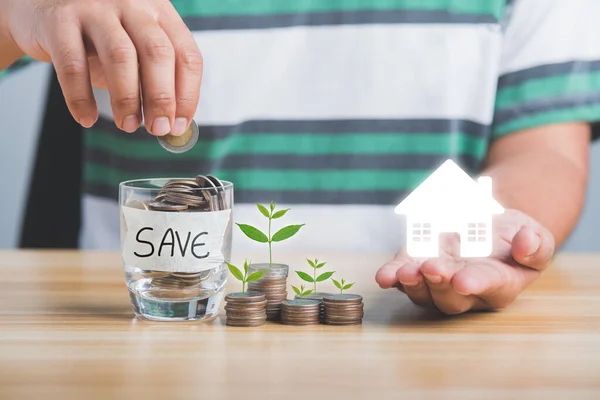 Man Hand Holds Coin Piggy Bank Future Home Purchases Money — Stock Photo, Image