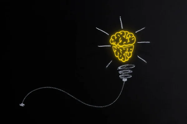 Great Idea and Innovation - light bulb on the black horizontal background.Education concept image.