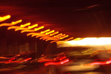 Soyut köşegen sarı ışık yolları. Hareket bulanıklığı Bokeh kutlama veya parti tasarımı için arkaplan çizer.