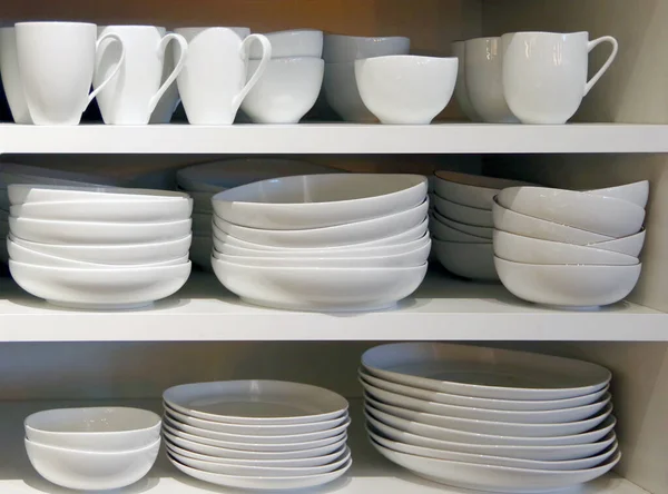 Close View Stacked White Ceramic Plates Bowls Cups Shelves — Stock Photo, Image