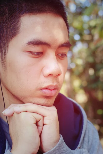 Portrait of Asia young teenage boy. Hand on chin.Vintage style. — Stock Photo, Image